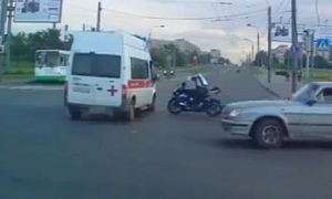 Rider Smashes Hard into Ambulance