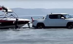 Rivian Owner Puts R1T Into Boat Launch Mode To Float Boat From Shore