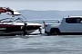 Rivian Owner Puts R1T Into Boat Launch Mode To Float Boat From Shore