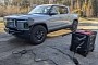 Rivian R1T Owner Charges His Truck Using a Gas Generator, Claims It's a Hybrid Now