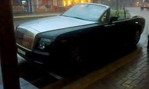 Rolls-Royce Drophead Coupe Left with Top Open in Rain Storm
