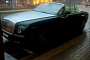 Rolls-Royce Drophead Coupe Left with Top Open in Rain Storm