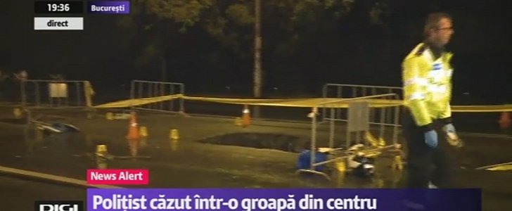 A cop dies in Romania after falling into a huge hole in the road