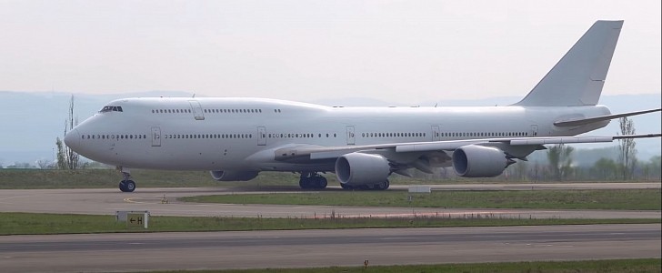 N458BJ, a privately-owned custom Boeing 747-8 that was hardly used, prepares for takeoff for its last flight ever