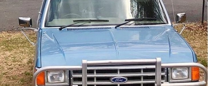 Russell Crowe shows off his old Ford pickup, repurposed into a firetruck