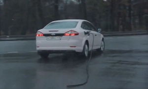 Russian Ford Mondeo Drives Off With Gas Pump Attached