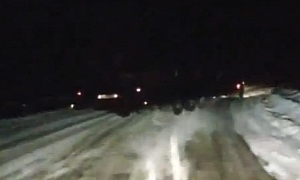 Russian 18-Wheeler Slides Trailer Around Corner - Narrowly Misses Oncoming Car