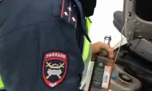 Russian Cop Uses Whiskey as Windshield Wiper Liquid for His Lada, Gets Fired