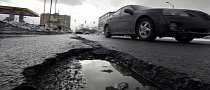 Russian Cyclist Fined for Damaging the Pothole He Fell In