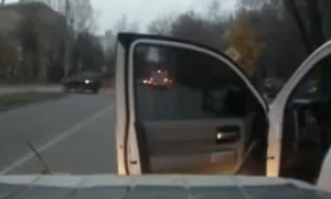 Russian Driver Decides No Door Will Stand in His Way