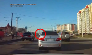 Russian Driver Near-Misses Two Pedestrians
