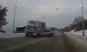 Russian Driver Slides, Has Frontal Crash With Truck