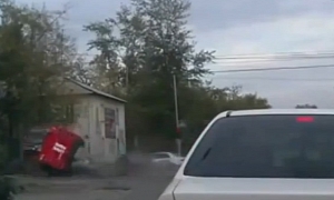 Russian Fire Truck Topples Over After Crashing