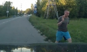 Russian Man Bails Out of Van and Causes Crash