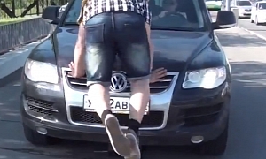 Russian Pedestrians Jump On Cars to Prevent Sidewalk Driving