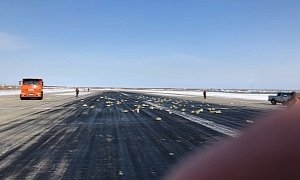 Russian Plane Drops Tons of Gold and Platinum Bars Through Cargo Door on Takeoff