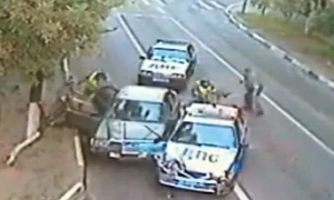 Russian Police Chase Caught on Traffic Camera