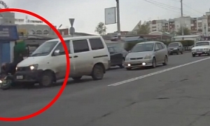 Russian Road Rage: Van Driver Crashes into Motorcycle