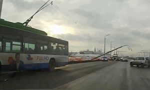 Russian Trolley Bus Pulls Down Power Lines
