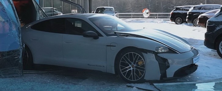 photo of Russian Vlogger Wrecks Taycan Turbo S Inside Porsche Dealership image