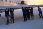 Russians Push an Airplane in Siberia after Its Wheels Froze to the Ground