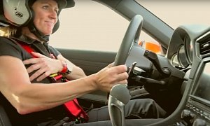 Sabine Schmitz Uses Porsche 911 GT3 and Nurburgring’s Karussell to Adjust Her Bra