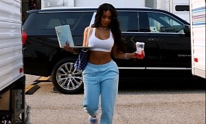 Saweetie Works on Her Music Even on the Move, in the Back Seat of a GMC Yukon Denali