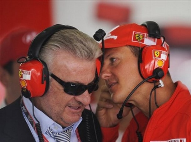 Michael Schumacher and manager Willi Weber