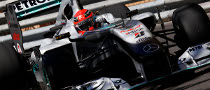 Schumacher Handed Penalty for Alonso Pass