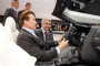Schwarzenegger Takes a Walk at Geneva Motor Show