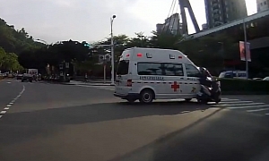 Scooter Idiot Crashes into an Ambulance