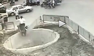 Scooter Rider Hits 4 Vehicles then Falls into Huge Pit