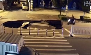 Scooter Rider Plunges into Giant Sinkhole to Prove Darwin Wrong
