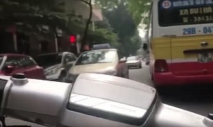 Scooter Rider Thinks He Is Invincible In Vietnam Traffic
