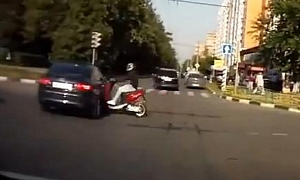Scooter Smashes Hard into Car