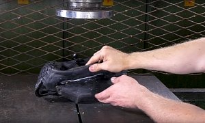 See What Happens When an Overinflated Tire Gets Squashed by a Hydraulic Press