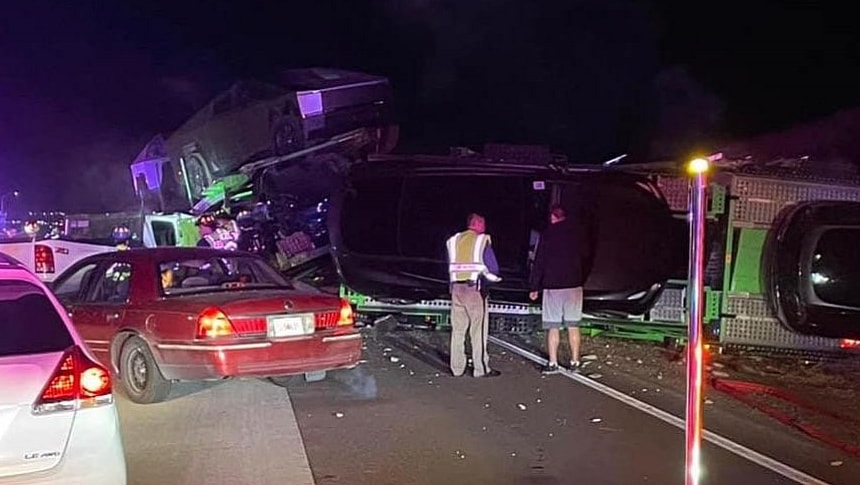 A semi-truck transporting Tesla Cybertrucks flipped over on a highway in Colorado