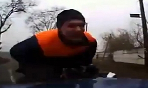 Sidecar Motorcyclist Crashes Head-On into Car