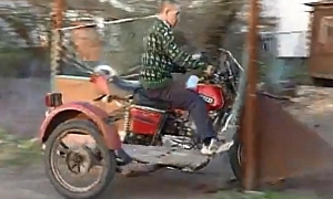 Silly Russian Rider Happily Drives Into Metal Gate