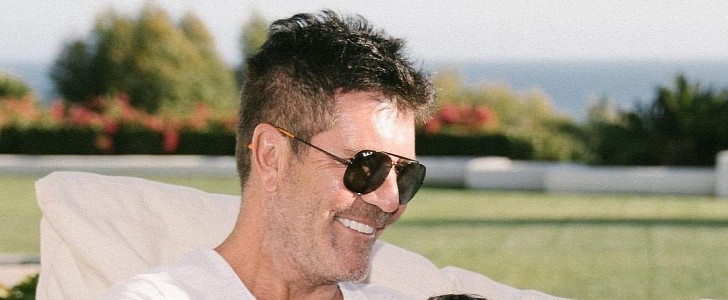 Simon Cowell and his son Eric, who's been teaching him a lot about climate change
