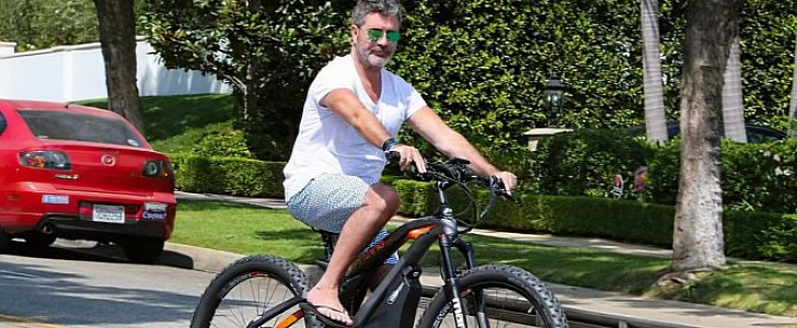Simon Cowell has been hospitalized after crashing his e-bike again
