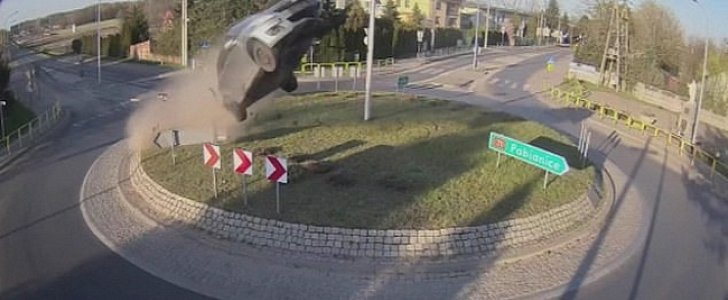 Suzuki Swift goes airborne after hitting roundabout embankment