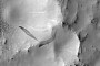 Slope Streaks on Ancient Mars Crater Look Like an Alien Company’s Logo