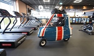 Smallest Car in the World Drives in a Gym; Driver Throws Punches, Pumps Iron, and Leaves