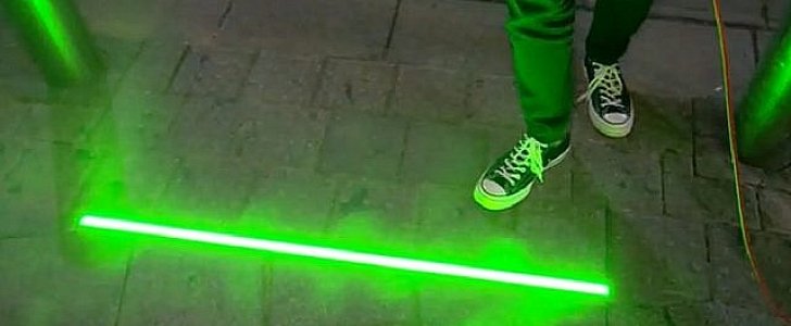 Special LED sidewalk light in Tel Aviv, Israel for "smartphone zombies"