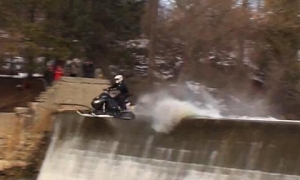 Snowmobile Rider Jumps from Dam, Doesn't Give a Damn