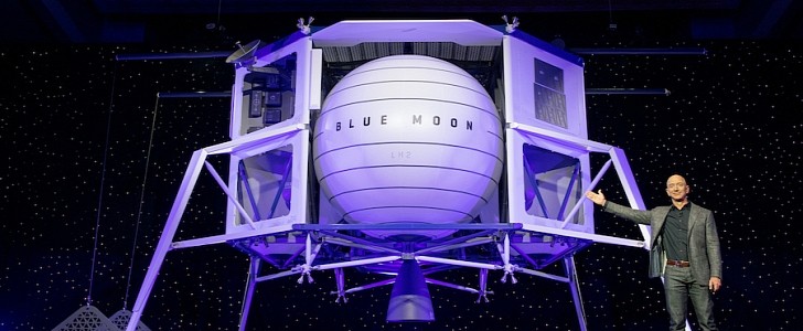 Jeff Bezos next to the Blue Moon, a lander design concept for making cargo deliveries to the Moon