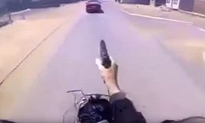 South African Motorcycle Police Officer Using Guns During Suspect Chase