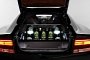Special Aston Martin Travels Asound Italy with Don Perignon Champagne in Its Trunk