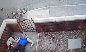 Speeding Cyclist Misses a Turn, Hits a Wall And Does a Complete Flip Over It